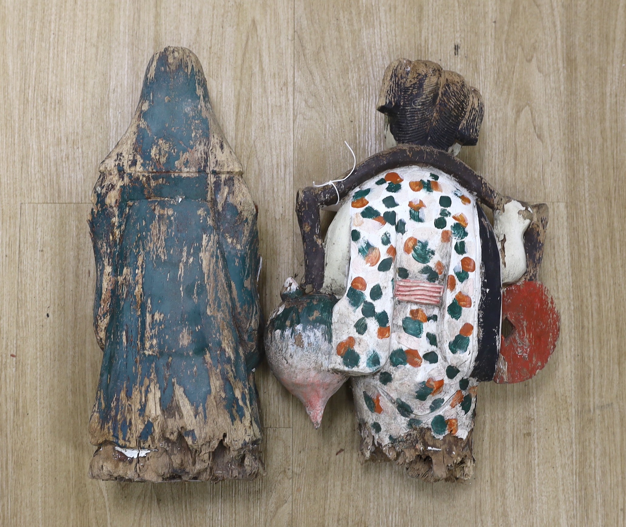 Two Chinese carved wood polychrome figures, largest 52cm